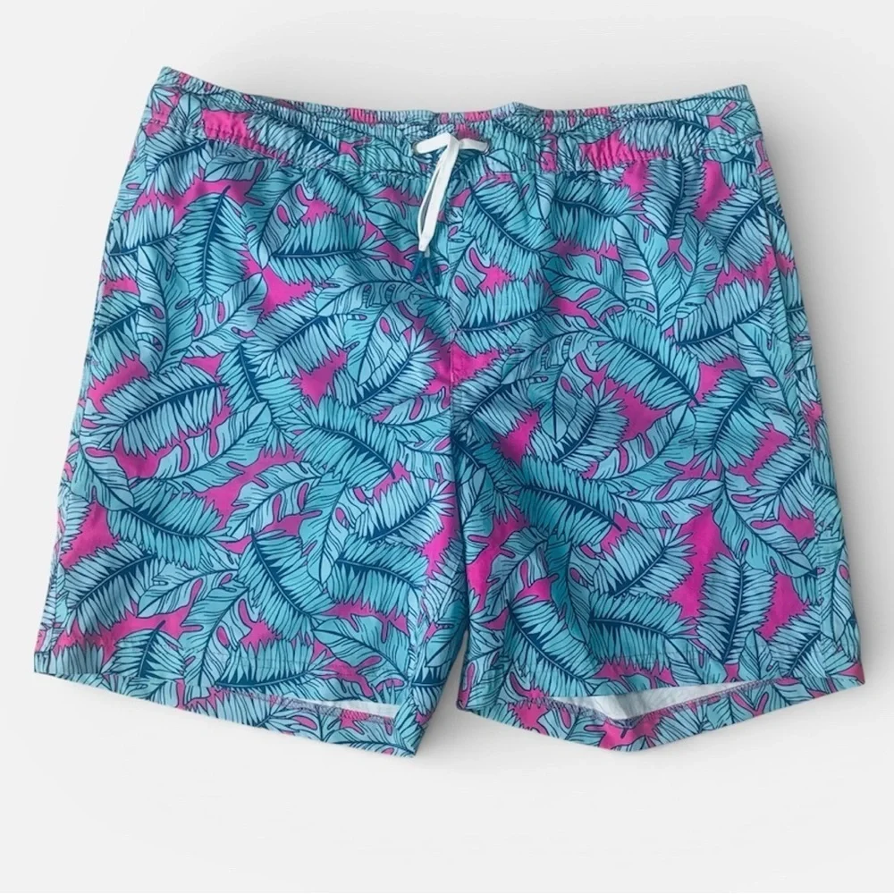 Vibrant Blue and Pink Leaf Pattern Swim Trunks
